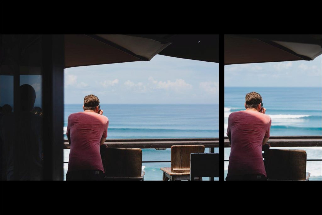 Photographer Bali: watching the waves from a cafe above.