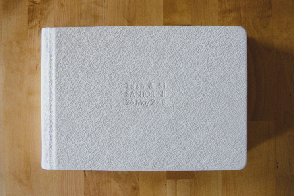 Santorini wedding album 00 | Wedding photographer Santorini | Love stories by Ben and Vesna 12x8 Santorini wedding album layout sample.