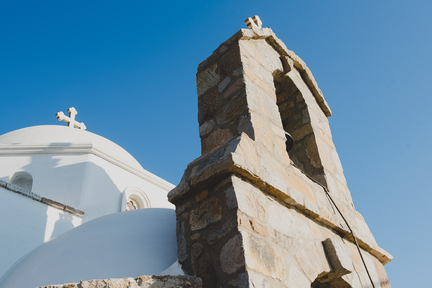 Wedding photographer Mykonos: church bell tower at Mykonos wedding.