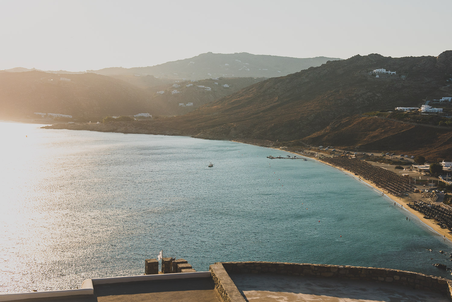 Wedding photographer Mykonos: beautiful views of the beach and hills for this Mykonos wedding.