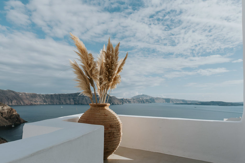 Santorini elopement photographer: ceremony terrace and the views by Ben and Vesna.