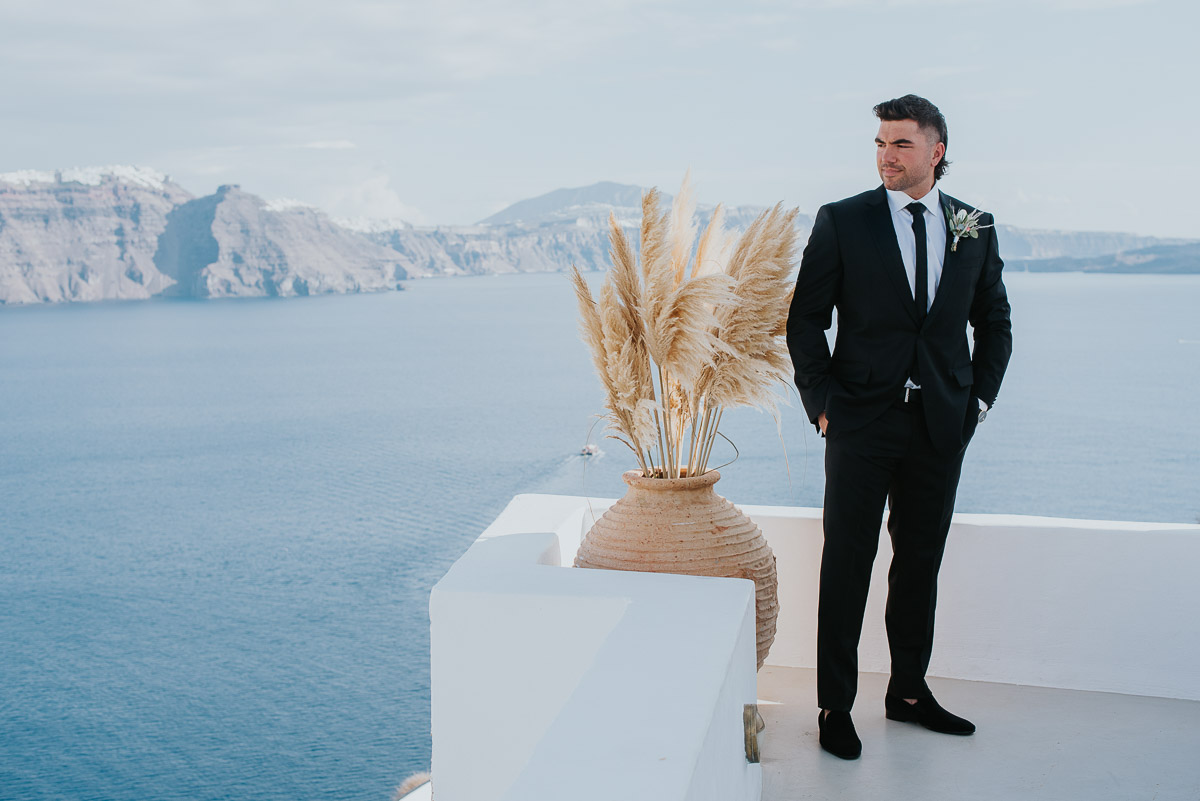 Santorini elopement photographer: groom's portraits by Ben and Vesna.