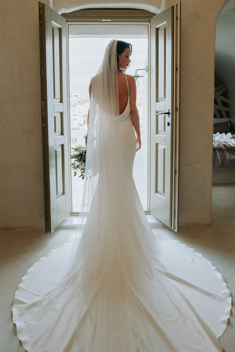 Santorini elopement photographer: bride's portraits by Ben and Vesna.