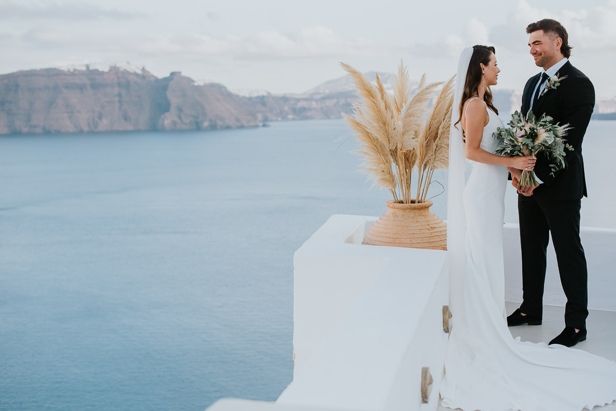 Santorini elopement photographer: couple before ceremony by Ben and Vesna.