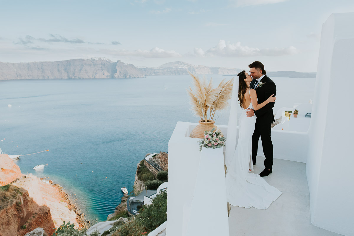 Santorini elopement photographer: couple just before first kiss by Ben and Vesna.