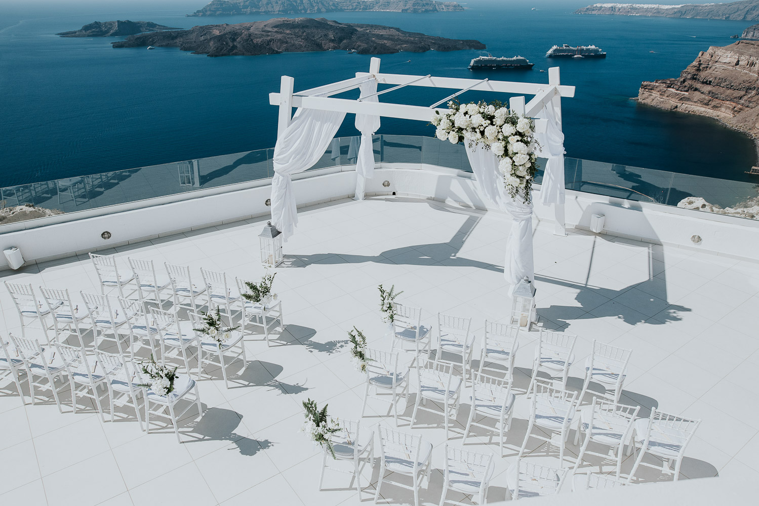 Wedding photographer Santorini: views of the ceremony terrace by Ben and Vesna.